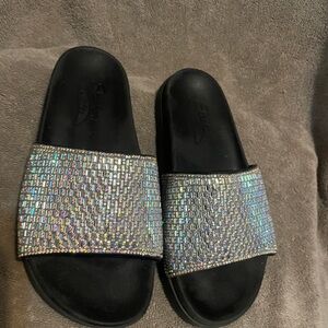 Sketcher Arch Fit stylish slip on sandals.